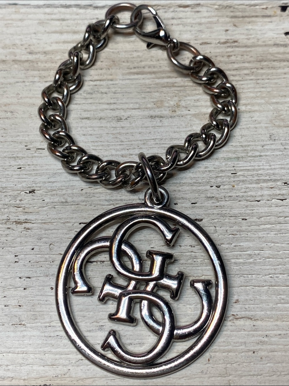 🍇 GUESS Silver Logo Pendant Charm